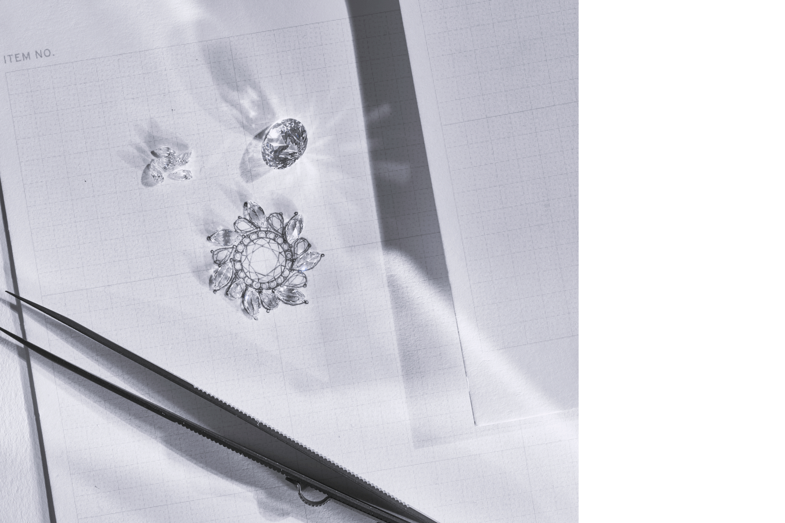 Detailed display of exquisite gemstone rings and diamond jewelry pieces for Leman Jewelry.